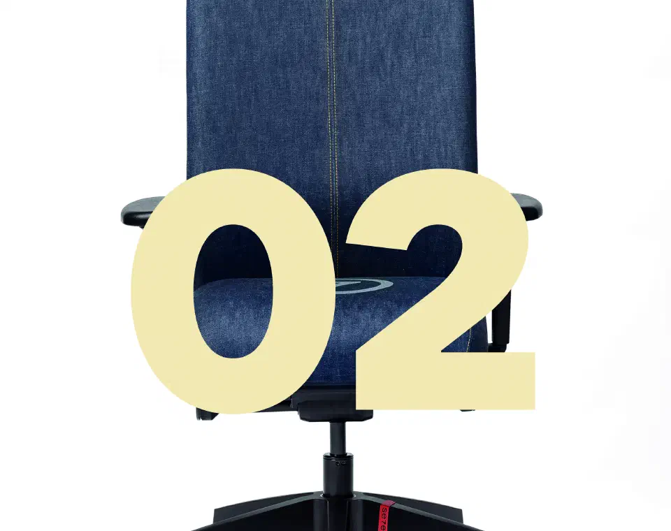 Denim Identity, a Se7en chair upholstered in worn denim